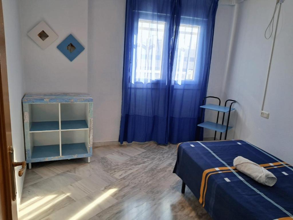 Posteľ alebo postele v izbe v ubytovaní Apartamento Azahar Fibes con garaje gratis