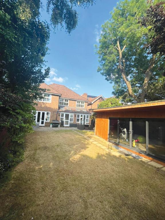 an empty yard in front of a building at Bramble Close in Chalfont Saint Peter
