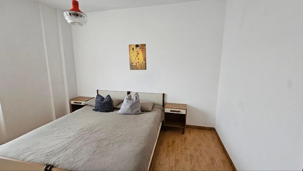 Postel nebo postele na pokoji v ubytování Appartamenti Croz del Re
