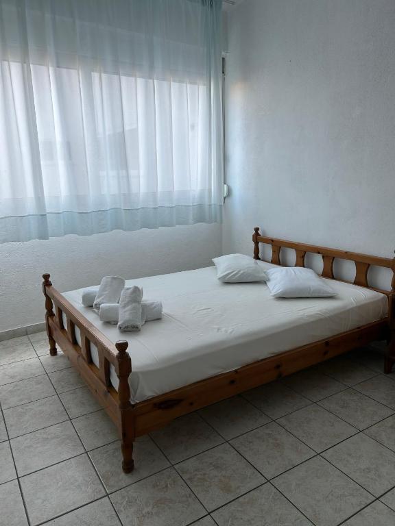 Postel nebo postele na pokoji v ubytování SIROS HOTEL