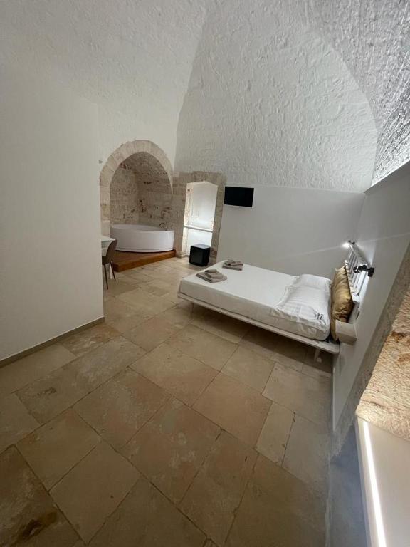 Una cama o camas en una habitación de Casa Mariù