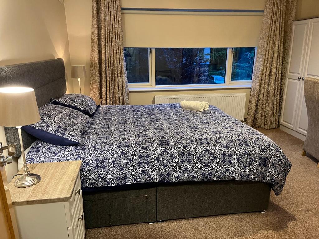 Postel nebo postele na pokoji v ubytování MapleHouse B&B