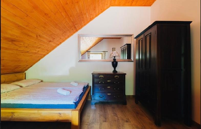 Postel nebo postele na pokoji v ubytování Apartamenty Cichy Kącik