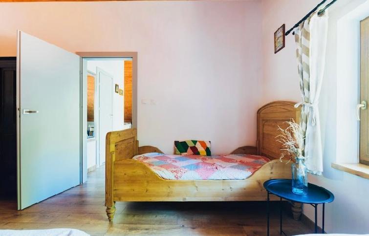 Postel nebo postele na pokoji v ubytování Apartamenty Cichy Kącik