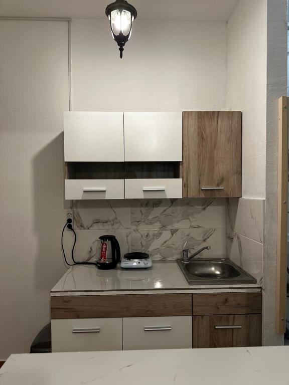 Kuchyň nebo kuchyňský kout v ubytování Green Villa