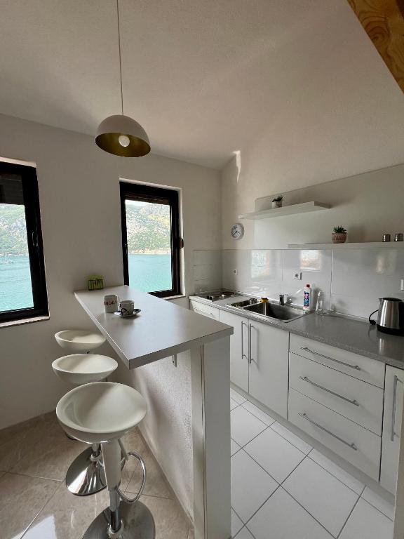 Kuchyň nebo kuchyňský kout v ubytování Tesla Apartman