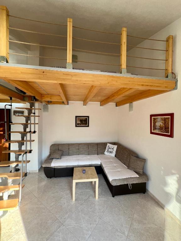 Posezení v ubytování Tesla Apartman