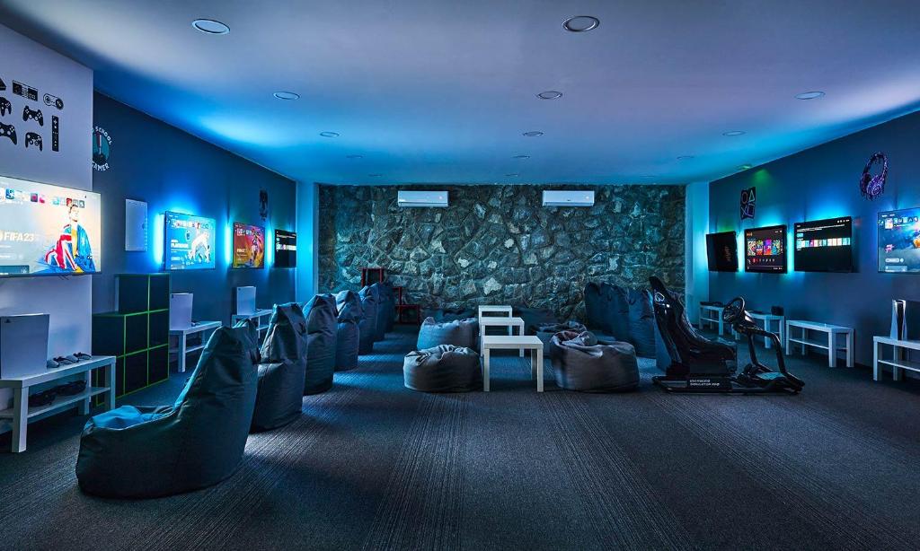 TV a/nebo společenská místnost v ubytování Magal Maradiso Hotel by Aminess