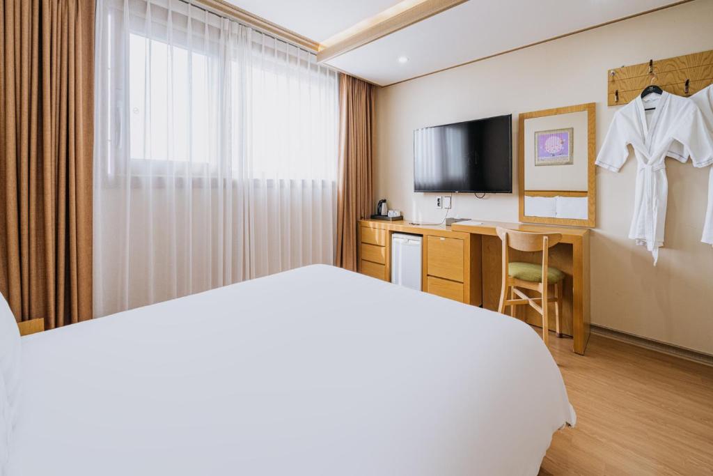 TV a/nebo společenská místnost v ubytování Nohyung Hotel