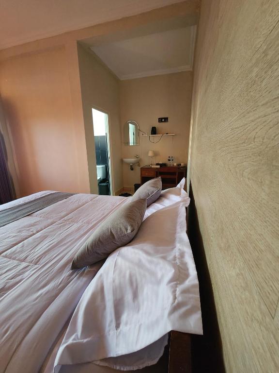 Postel nebo postele na pokoji v ubytování De La Sierra
