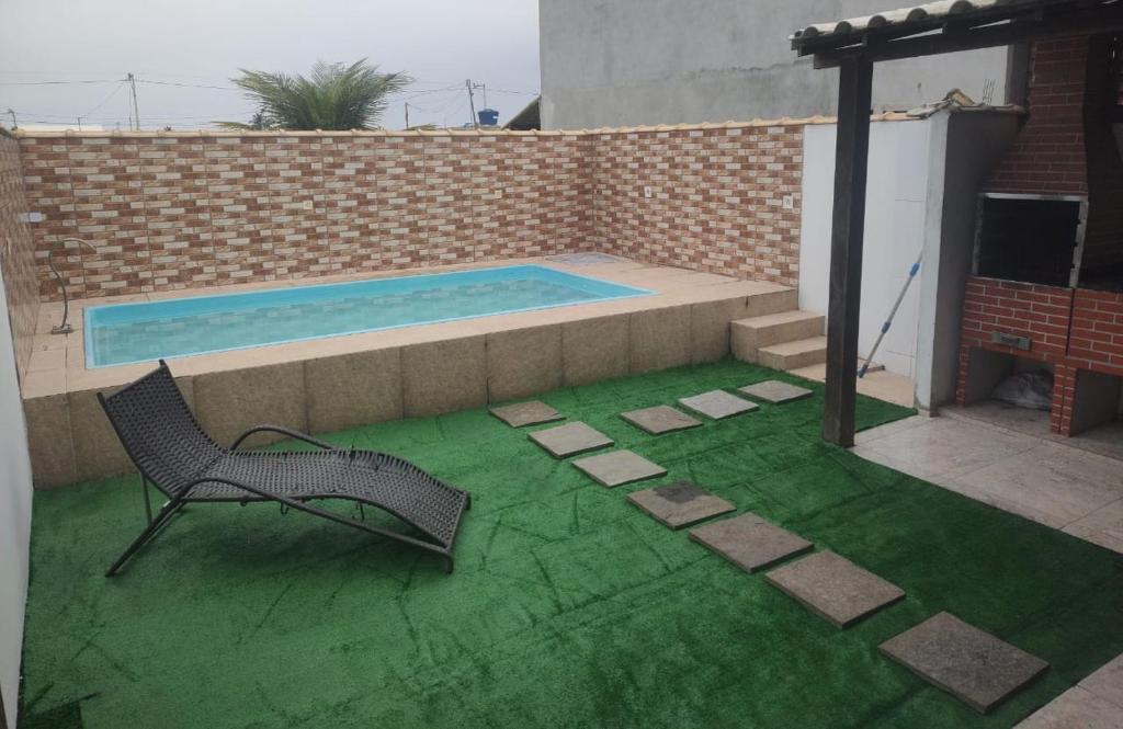 Kolam renang di atau dekat dengan CASA COSTA DO SOL, Com Piscina e Churrasqueira !!!