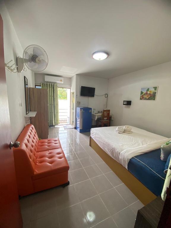 Postel nebo postele na pokoji v ubytování Jenny Hostel HuaHin
