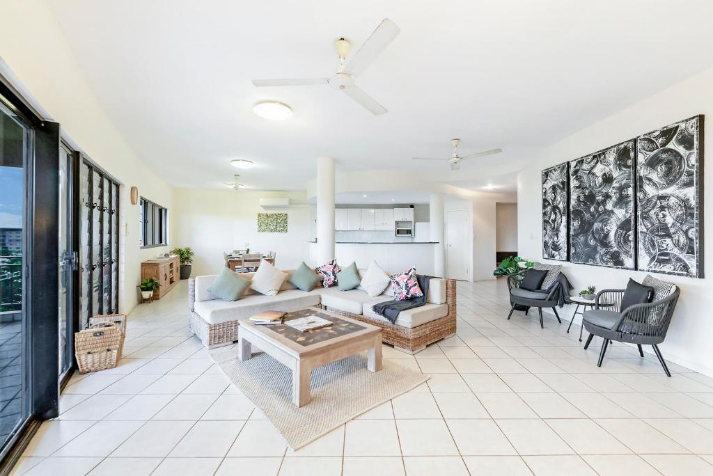 A seating area at Oceanview Tropical - A Top End Poolside Oasis