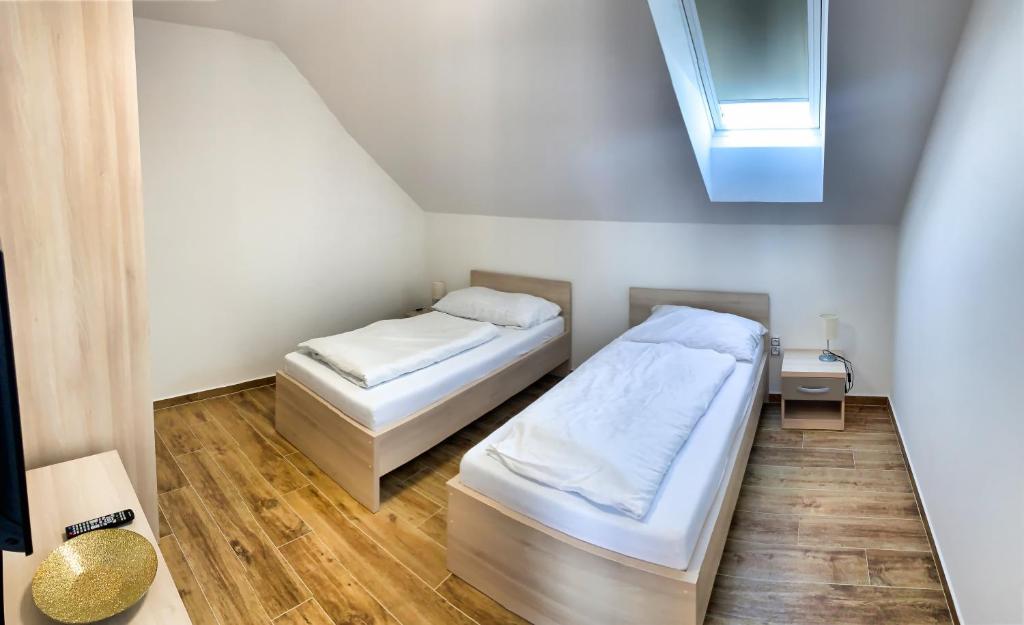 Postel nebo postele na pokoji v ubytování Apartmánové domy Lipno 1