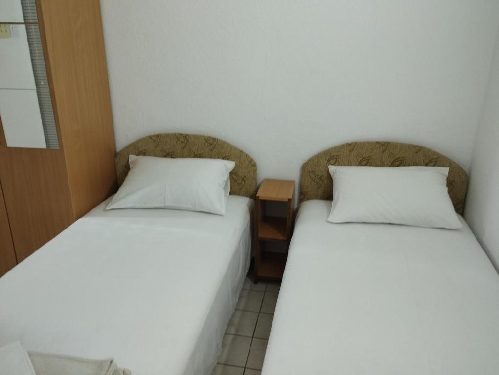 Ένα ή περισσότερα κρεβάτια σε δωμάτιο στο Milica Soba 1