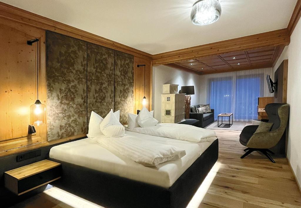 Postel nebo postele na pokoji v ubytování Hotel Unterwirt
