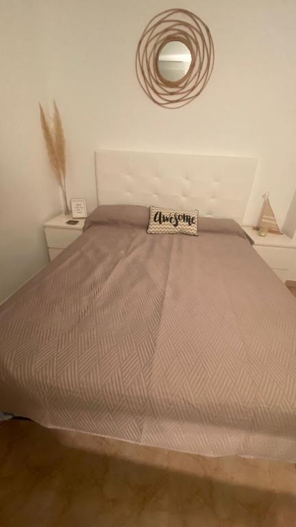 Posteľ alebo postele v izbe v ubytovaní Apartament a Sant Antoni de Calonge