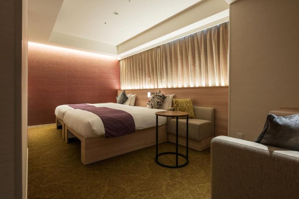 Postel nebo postele na pokoji v ubytování Hotel JAL City Haneda Tokyo West Wing