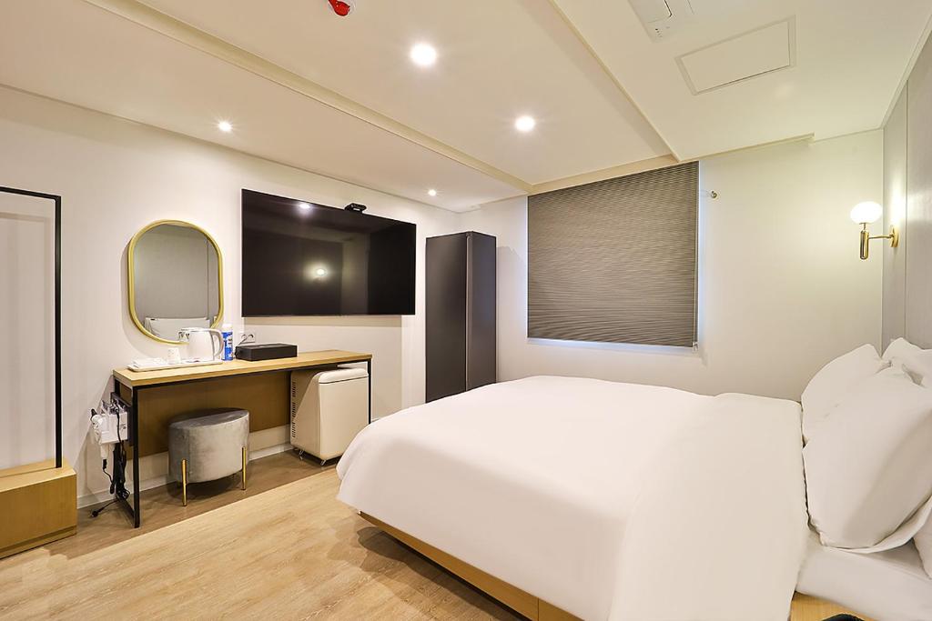 Postel nebo postele na pokoji v ubytování Rubato Hotel Ulsan Junggu