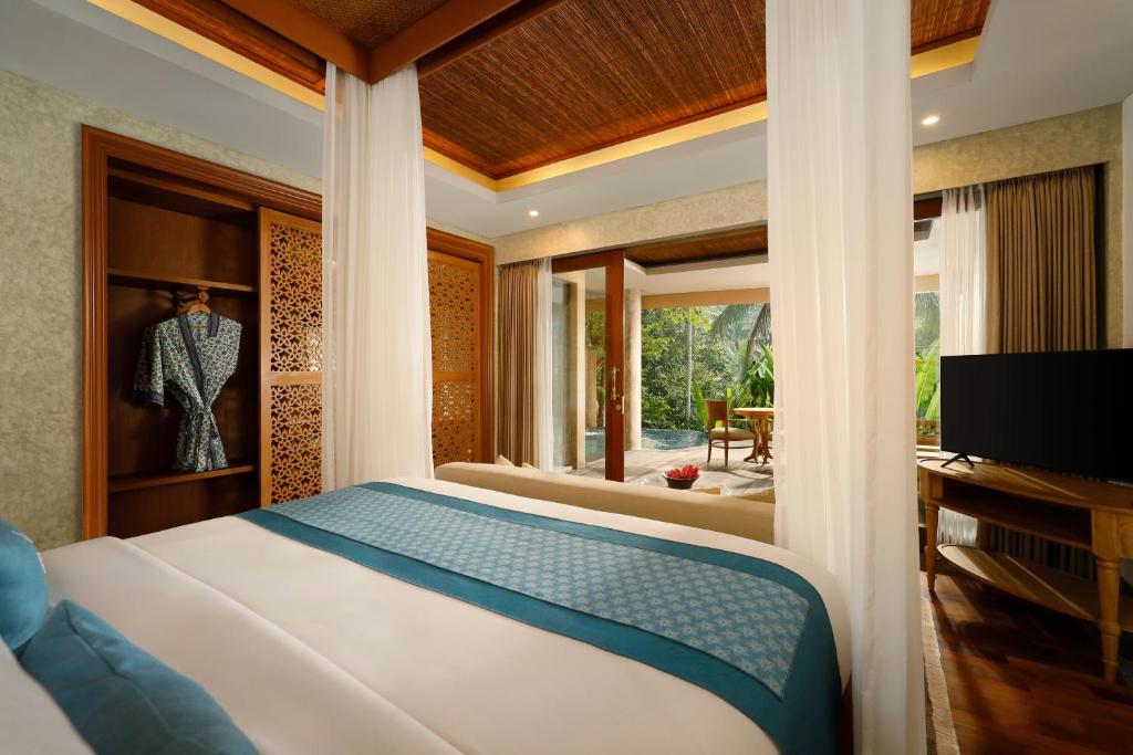 Postel nebo postele na pokoji v ubytování Abisena Wellness & Resort Ubud-Adult Only