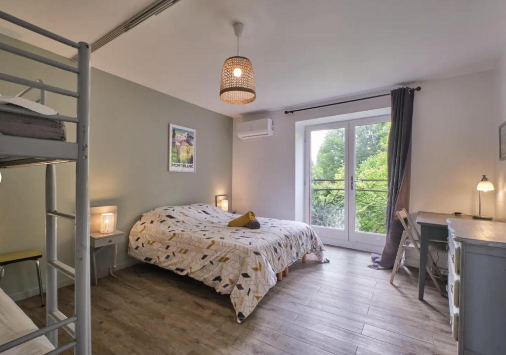 Photo de la galerie de l'établissement Gîte Laportella - Chambre, à Corbelin