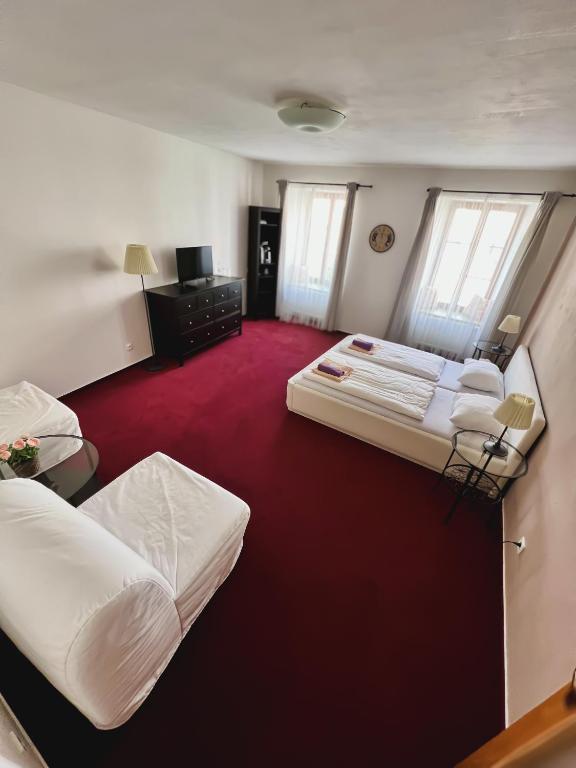 Postel nebo postele na pokoji v ubytování hotel Florian Sedlčany