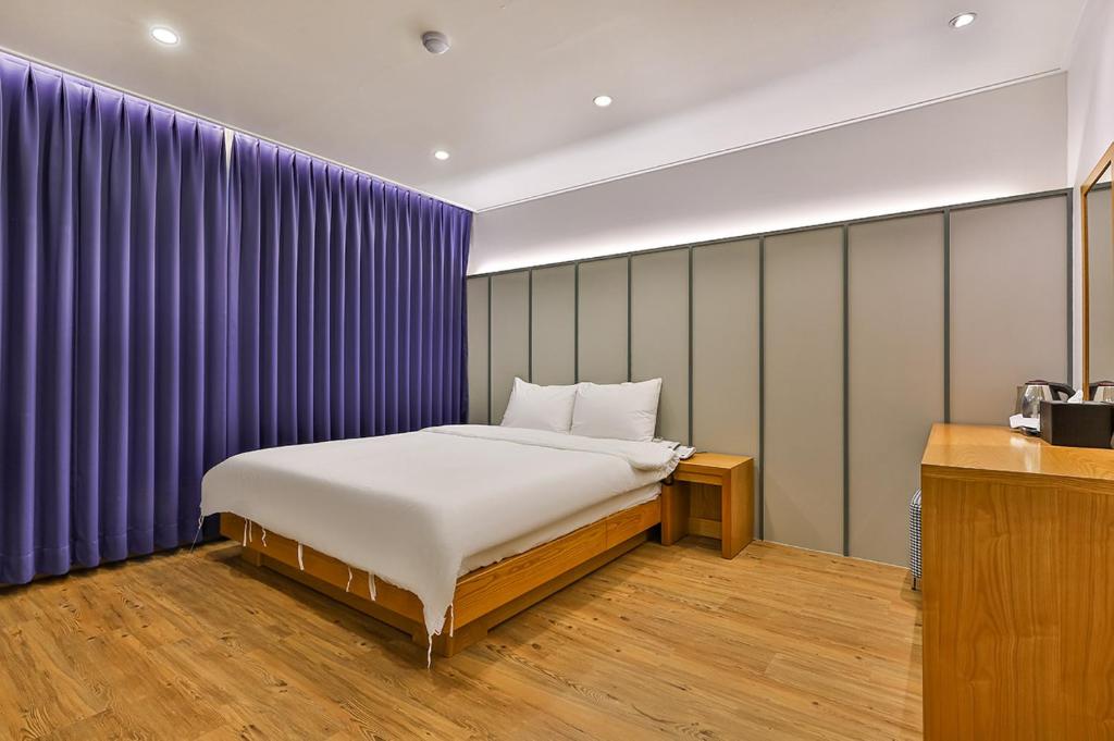 Postel nebo postele na pokoji v ubytování Hotel Langsam