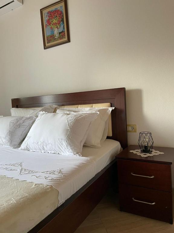 Postel nebo postele na pokoji v ubytování StoneTale Garden Guesthouse