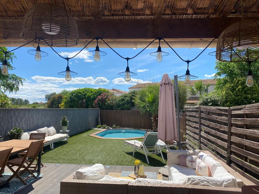 Photo de la galerie de l'établissement Villa Idéal Famille piscine et clim, à Lattes