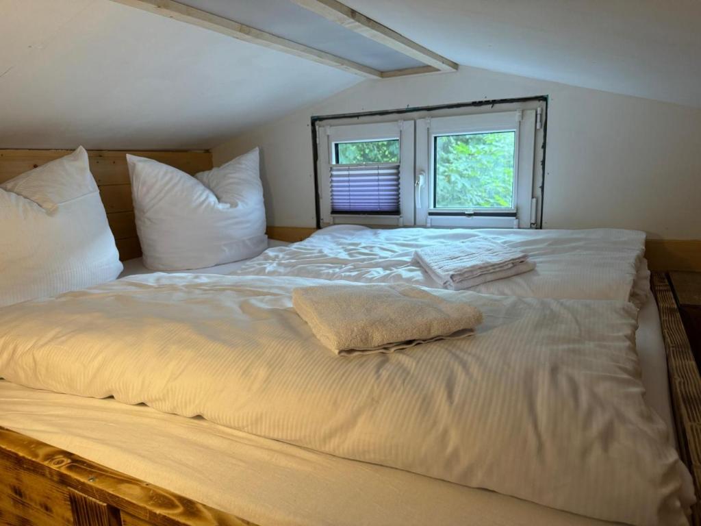 Voodi või voodid majutusasutuse Tiny House Triberg toas