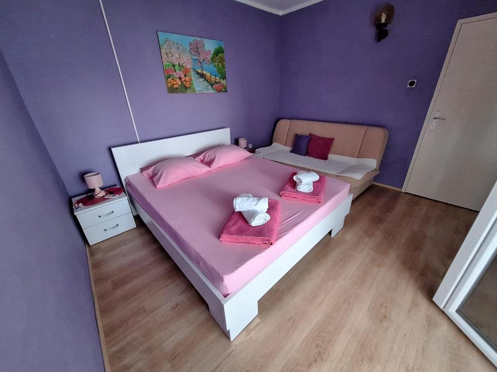 Postel nebo postele na pokoji v ubytování Sunset