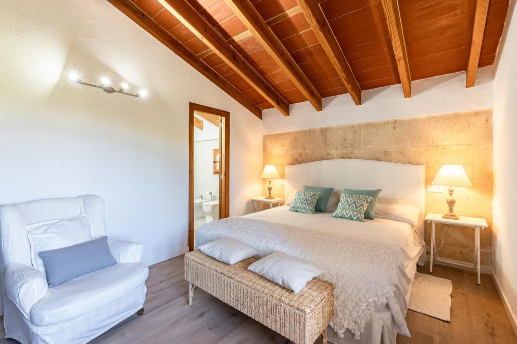 Postel nebo postele na pokoji v ubytování Villa Agueda