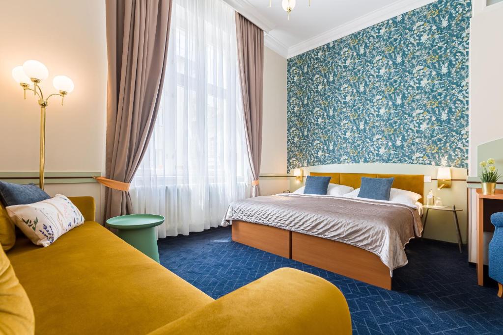 Postel nebo postele na pokoji v ubytování Hotel Arcus Garden