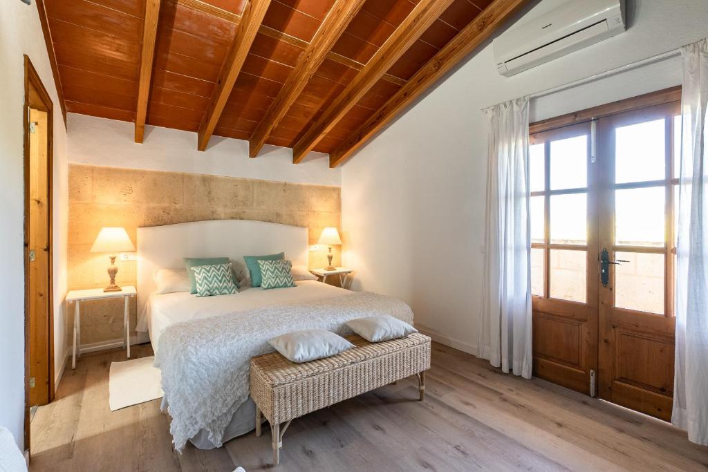 Postel nebo postele na pokoji v ubytování Villa Agueda