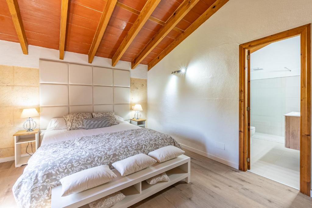 Postel nebo postele na pokoji v ubytování Villa Agueda