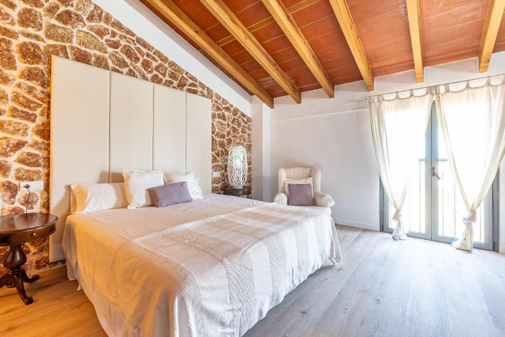 Postel nebo postele na pokoji v ubytování Villa Agueda