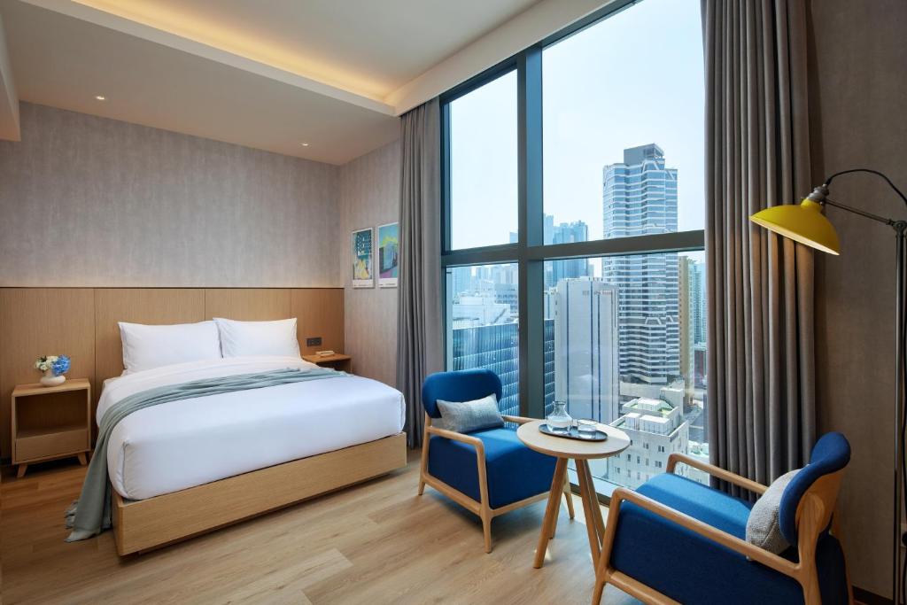 Postel nebo postele na pokoji v ubytování L7 HAEUNDAE by LOTTE