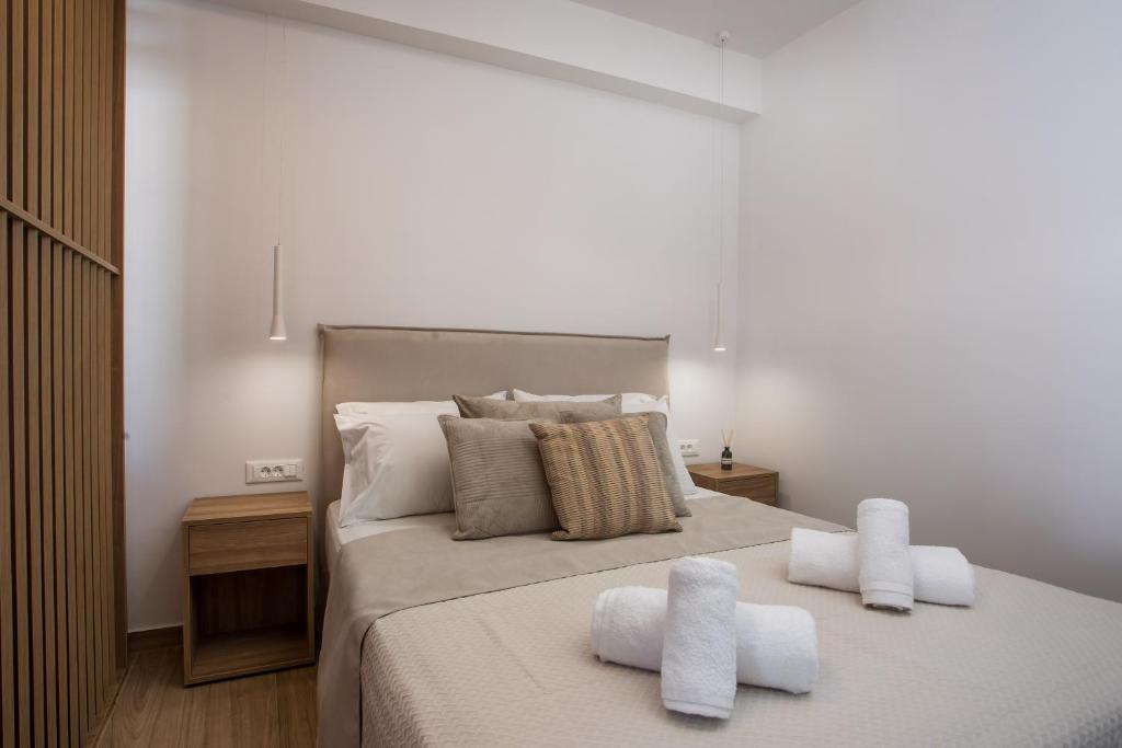 Postel nebo postele na pokoji v ubytování Cactus Suites