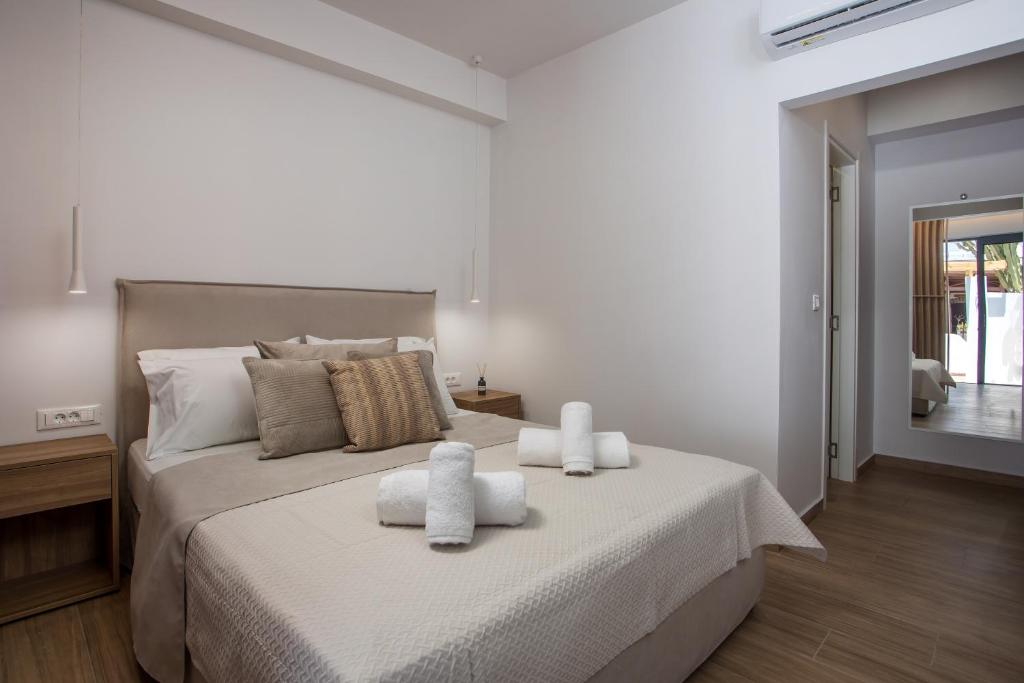 Postel nebo postele na pokoji v ubytování Cactus Suites