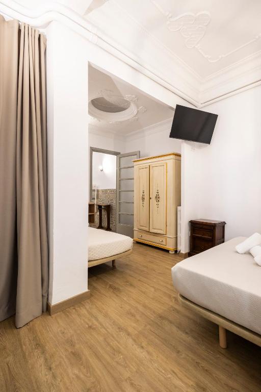 Posteľ alebo postele v izbe v ubytovaní Live in Chianti Apartaments by Concept Flats