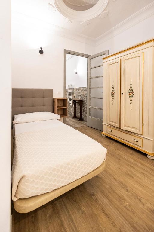 Posteľ alebo postele v izbe v ubytovaní Live in Chianti Apartaments by Concept Flats