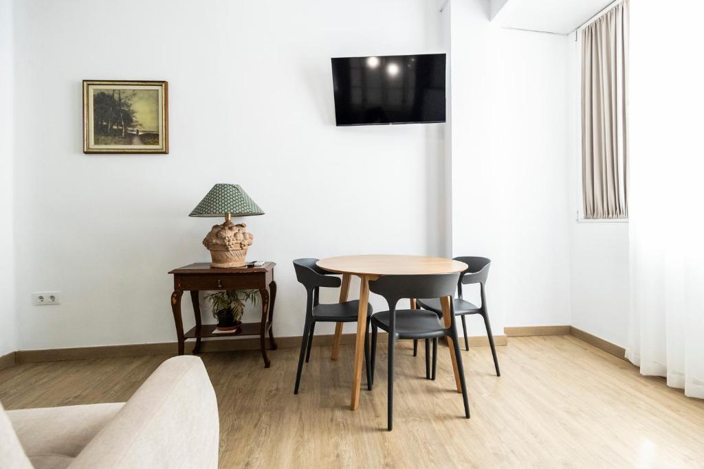 Televízia a/alebo spoločenská miestnosť v ubytovaní Live in Chianti Apartaments by Concept Flats
