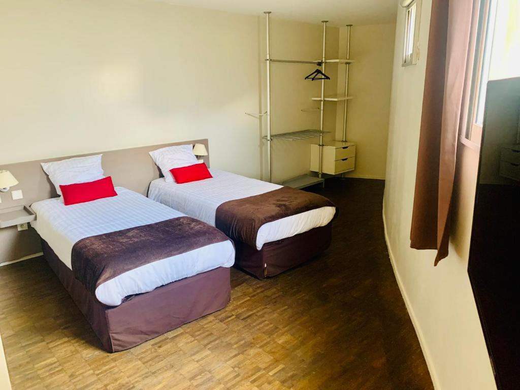 Postel nebo postele na pokoji v ubytování Standing Hotel Suites by Actisource