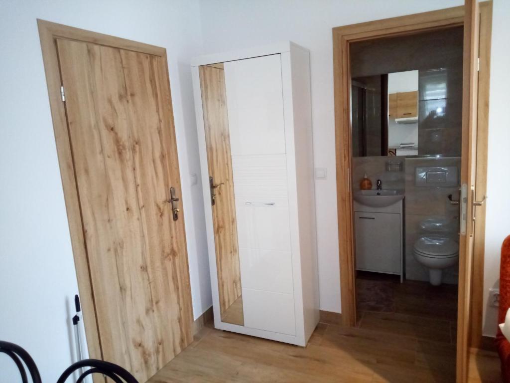 Kuchyň nebo kuchyňský kout v ubytování Sjesta Jantar