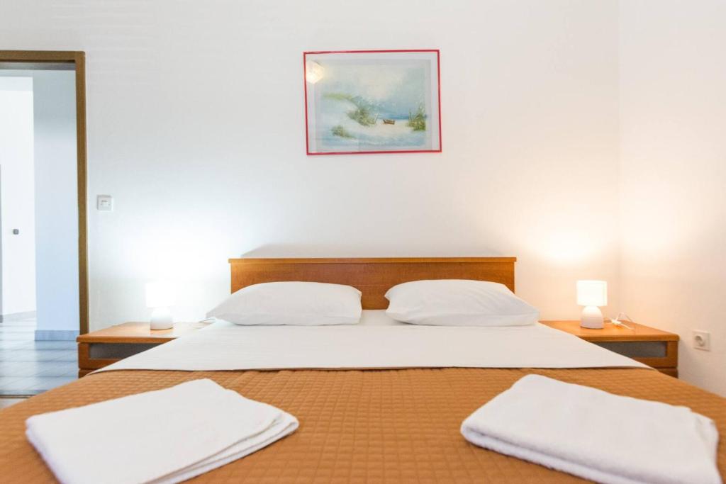 Łóżko lub łóżka w pokoju w obiekcie Apartment Rajna