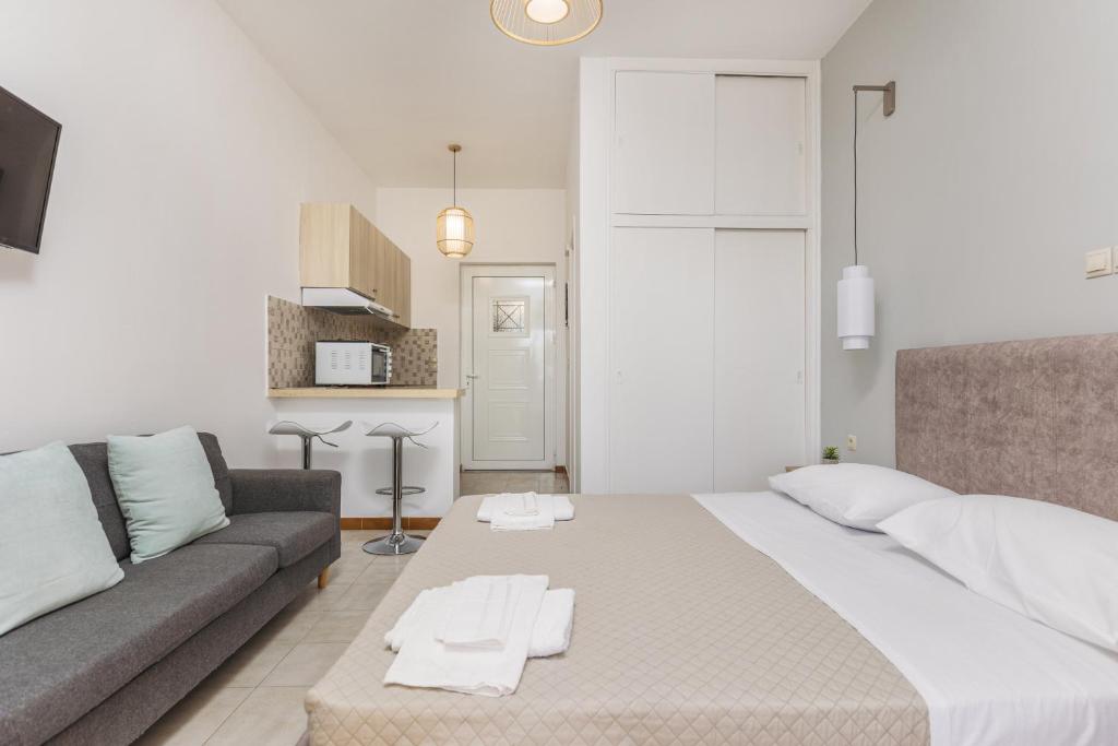Postel nebo postele na pokoji v ubytování P Koklas Apartments