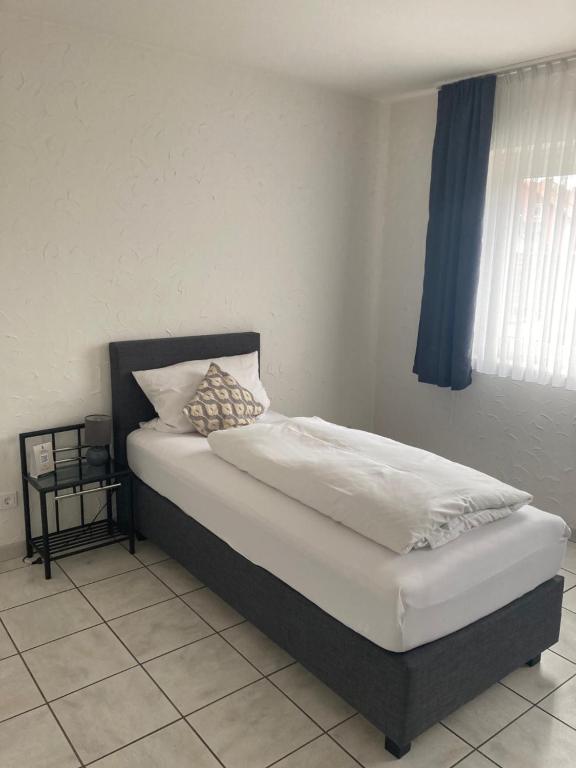 Postel nebo postele na pokoji v ubytování Hotel zur Schlemmerscheune