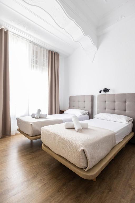 Posteľ alebo postele v izbe v ubytovaní Live in Chianti Apartaments by Concept Flats