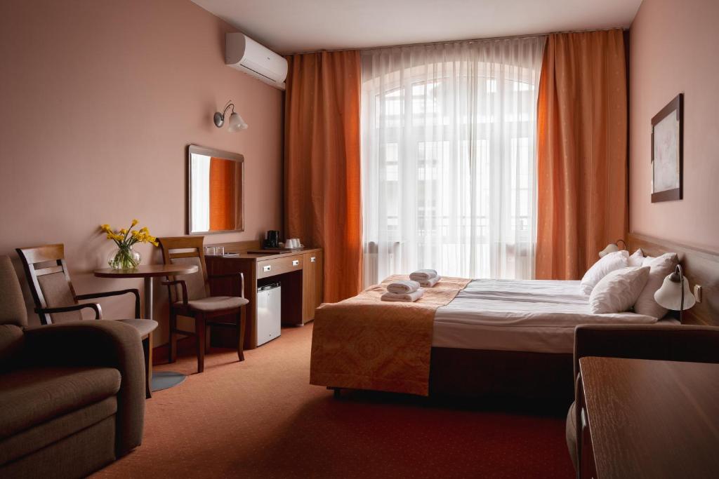 Posedenie v ubytovaní Paria Hotel