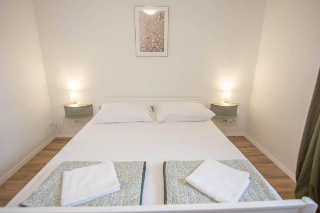 Posteľ alebo postele v izbe v ubytovaní Apartment Nia - dream vacation in Biograd